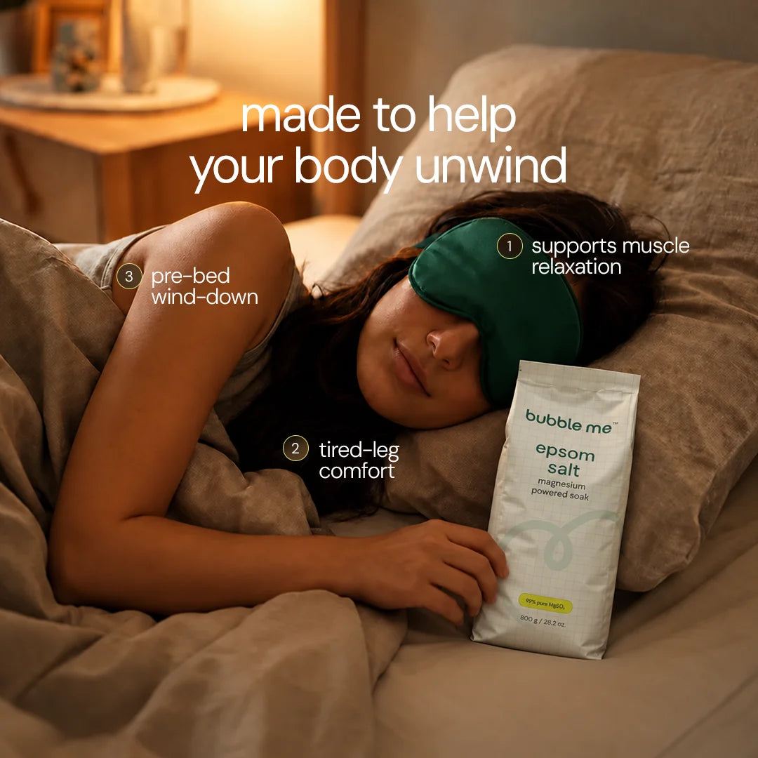A girl sleeping comfortably with bubbble me epsom salt packet beside her. 