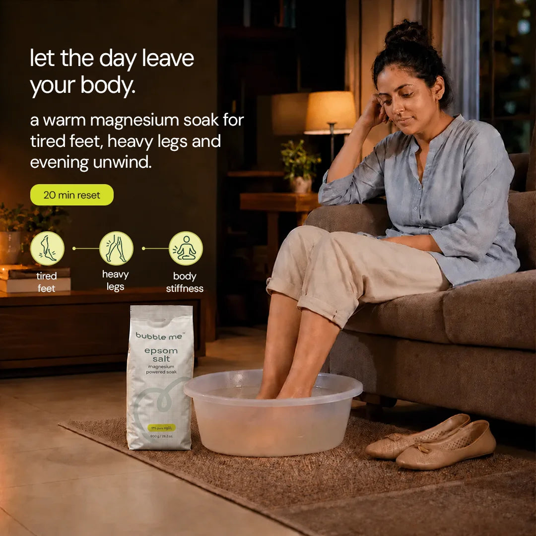 A woman soaking her feet on bubble me epsom salt.